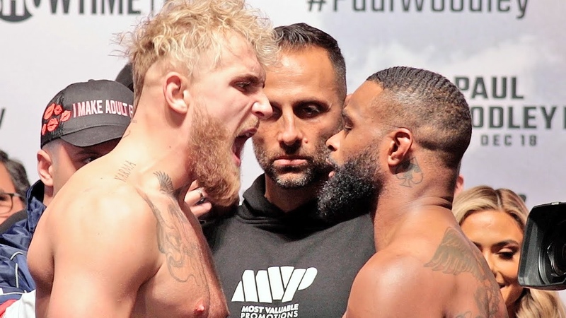 JAKE PAUL EXPLODES ON TYRON WOODLEY AT WEIGH IN; HAS HEATED VERBAL EXCHANGE AT FACE OFF FULL