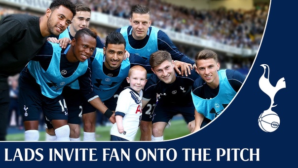 Mousa Dembele invites Marshall Janson onto the pitch at White Hart