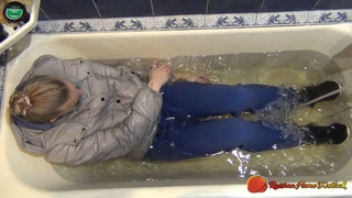 Russian Home Wetlook - rhw_063. Bath in a warm tracksuit, socks, sneakers and a warm jacket.