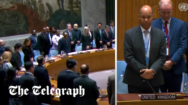 Moment UK and US representatives at UN controversially pay respects to Irans