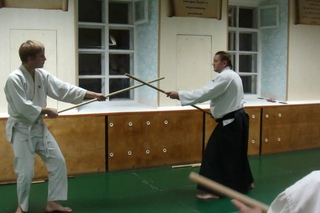 Aiki jo paired exercises with a stick (kumi jo)